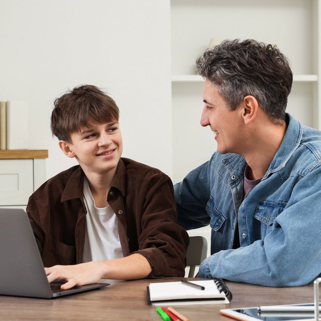 Parent talking to child through finances.